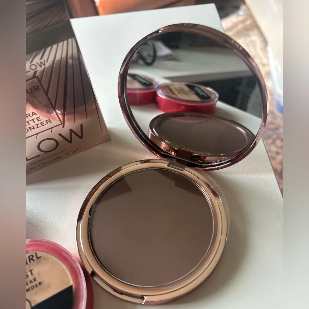 New Revolution Glow Bronzing Powder and Revlon Setting Powder